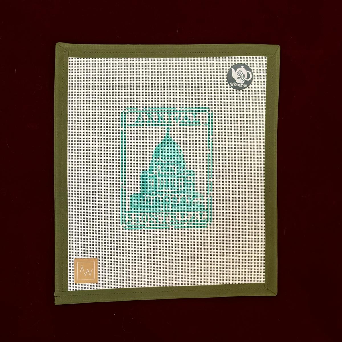 Needlepoint canvas design with green text "Arrival Montreal" 