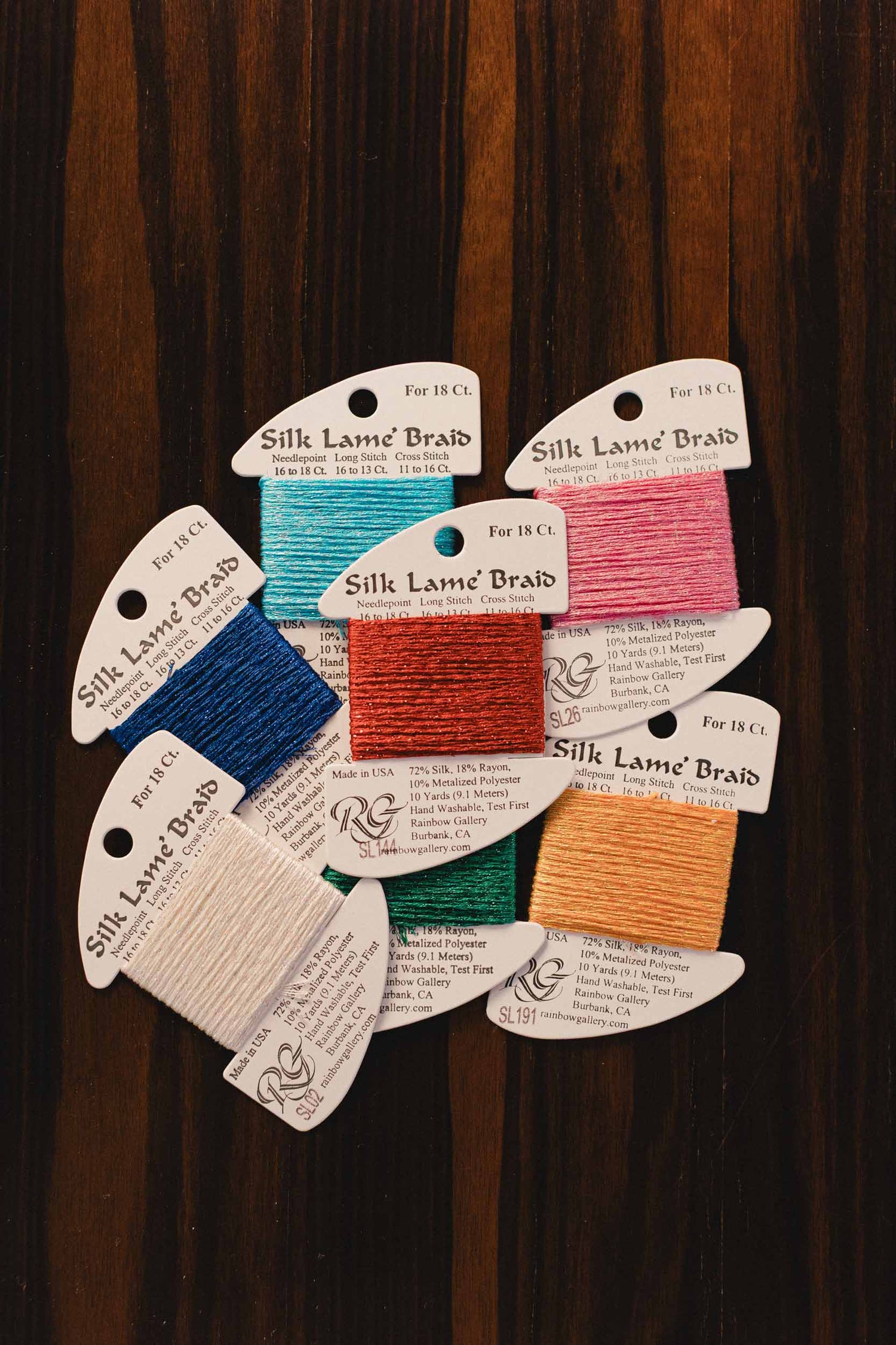 Collection of colorful Silk Lame' Braid needlepoint, cross stitch and long stitch threads. For 18 count mesh canvases. | The Pepper Pot, Barrington, IL