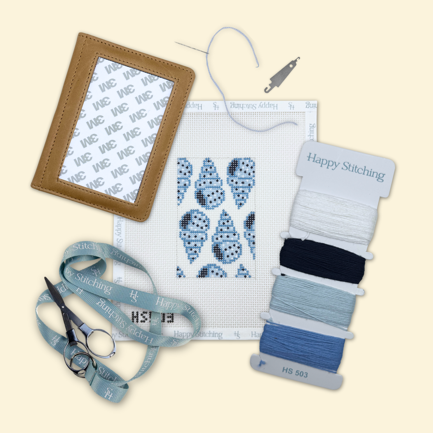 Shell needlepoint canvas with threads, scissors and self finishing case for beginners available at The Pepper Pot in Barrington IL