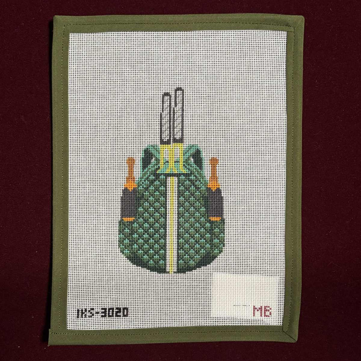 Needlepoint canvas design of a green tennis backpack with champagne bottles on a red background